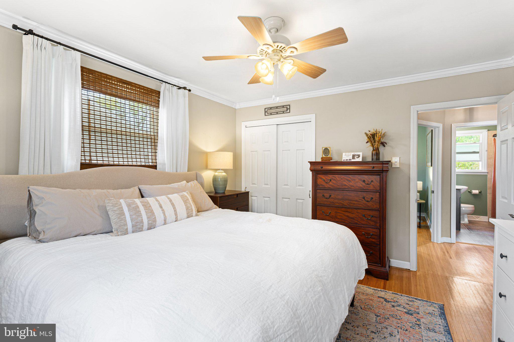725 West 3rd Avenue Runnemede, NJ 08078 - Photo 10 of 35 a bedroom with a bed and a chandelier