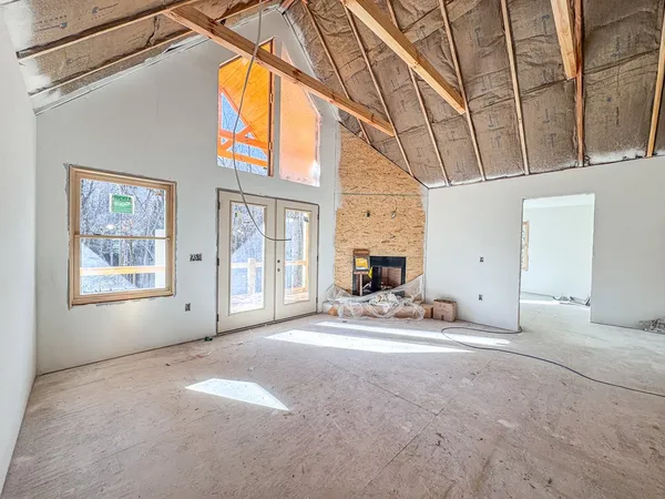 a view of empty room with windows