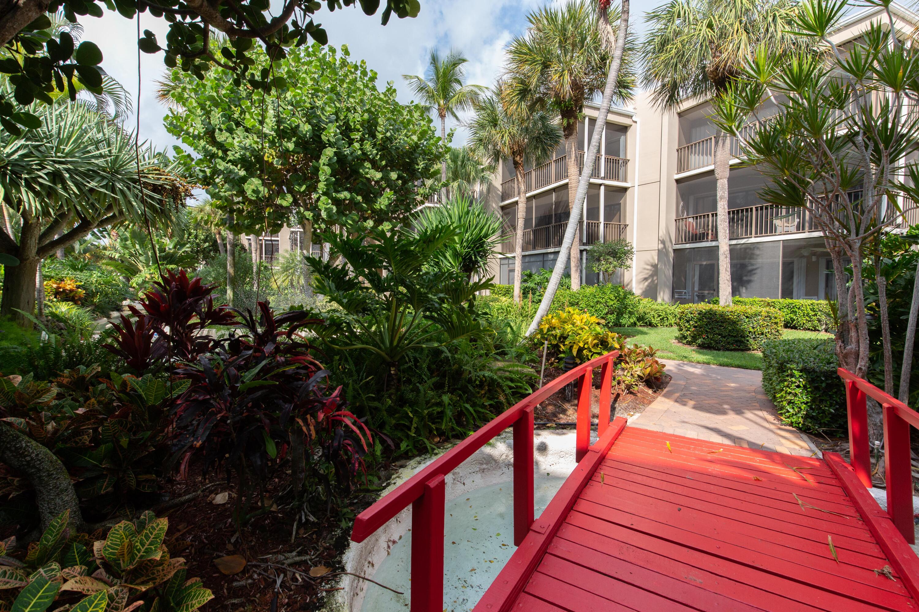 3605 South Ocean Boulevard South, Unit 103 South Palm Beach, FL 33480 - Photo 15 of 18 a view of a house with brick walls