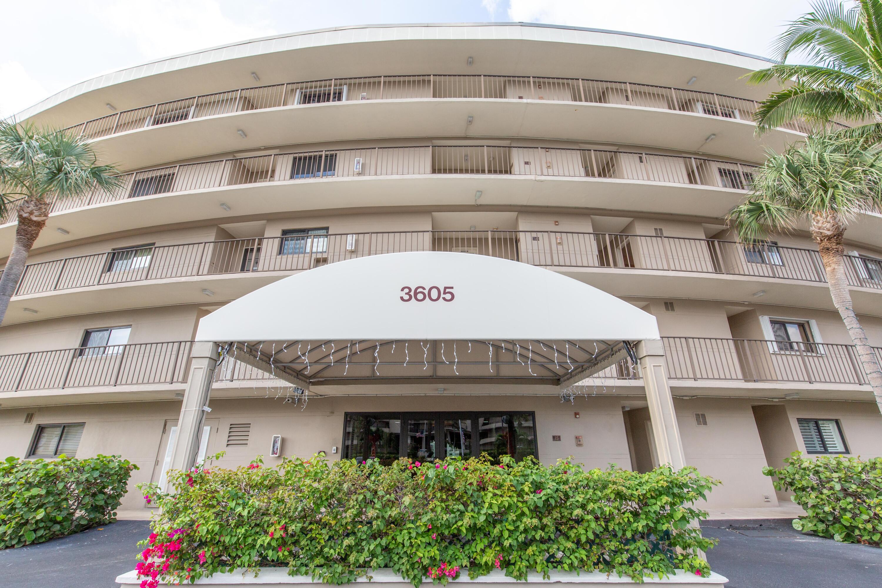 3605 South Ocean Boulevard South, Unit 103 South Palm Beach, FL 33480 - Photo 16 of 18 a front view of a building