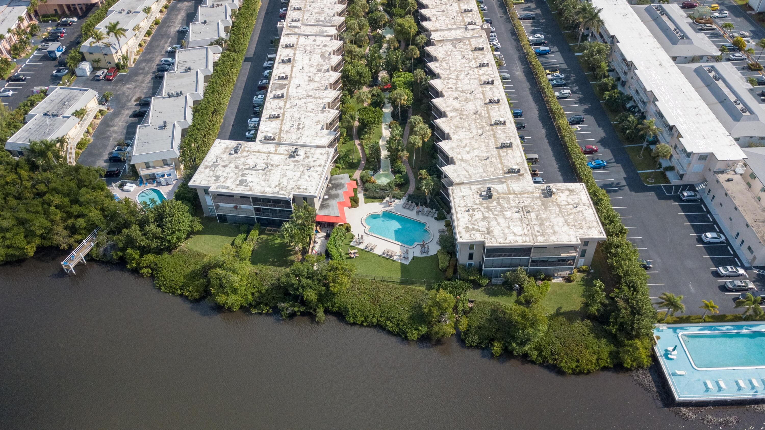 3605 South Ocean Boulevard South, Unit 103 South Palm Beach, FL 33480 - Photo 17 of 18 an aerial view of multiple house