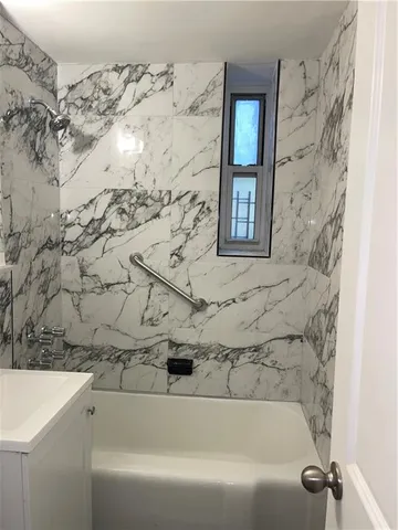a bathroom with a bathtub