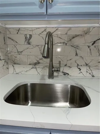 a close view of sink and tap