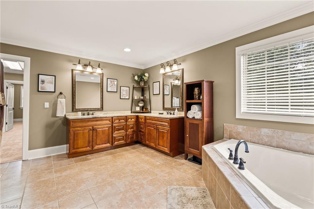 6202 Herons Nest Court Oak Ridge, NC 27310 - Photo 27 of 50 Primary bathroom