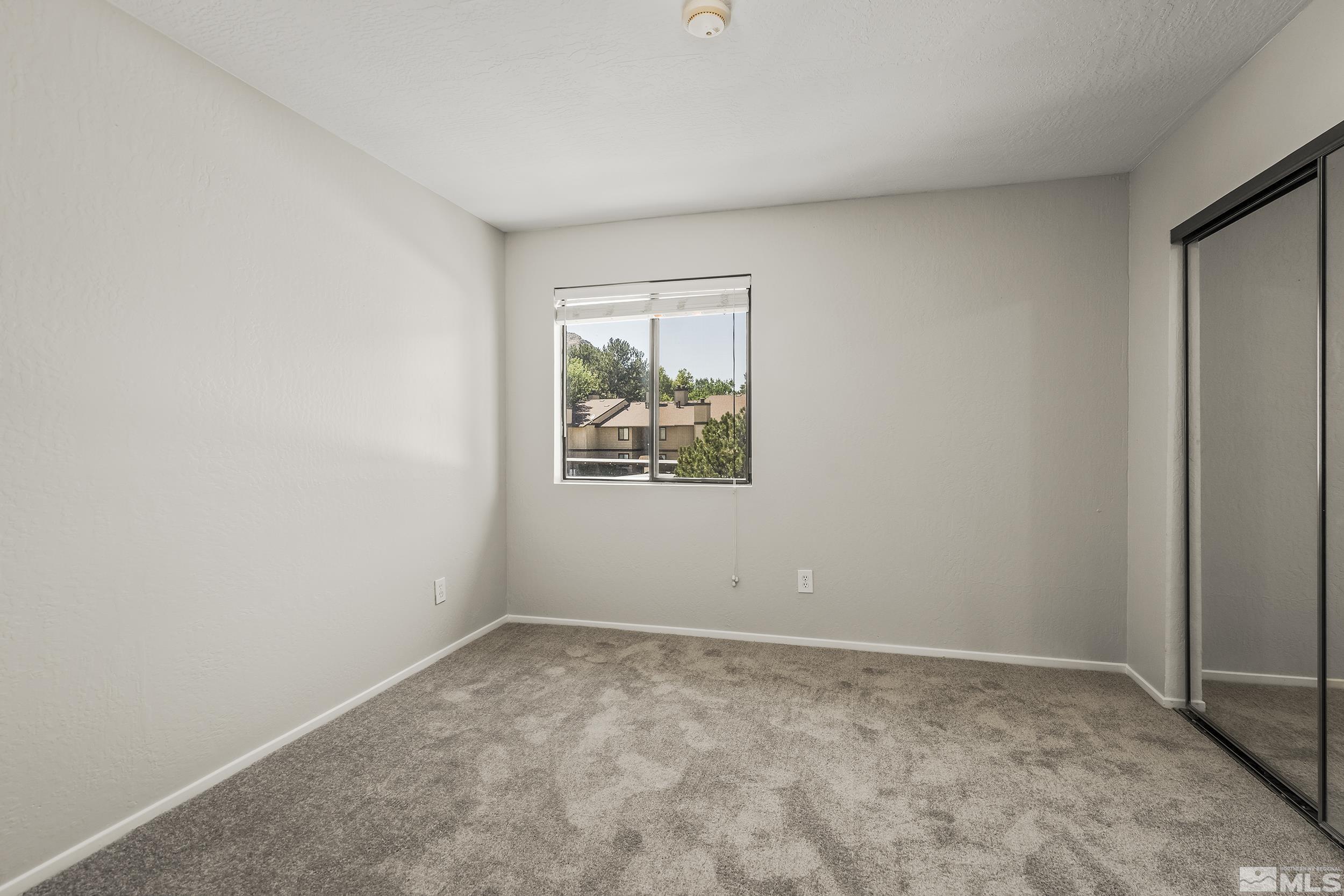 4694 Rio Poco Road Reno, NV 89502 - Photo 11 of 19 an empty room with windows