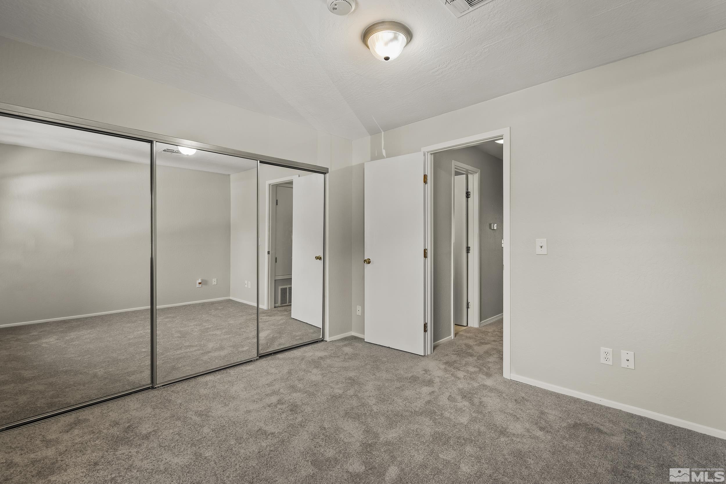 4694 Rio Poco Road Reno, NV 89502 - Photo 12 of 19 a view of an empty room