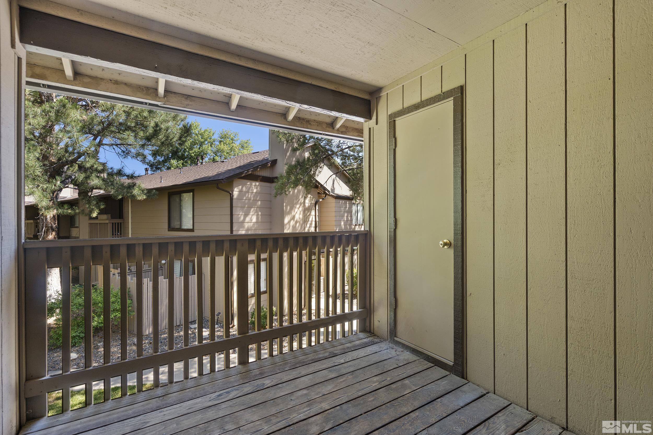 4694 Rio Poco Road Reno, NV 89502 - Photo 14 of 19 a view of a wooden door