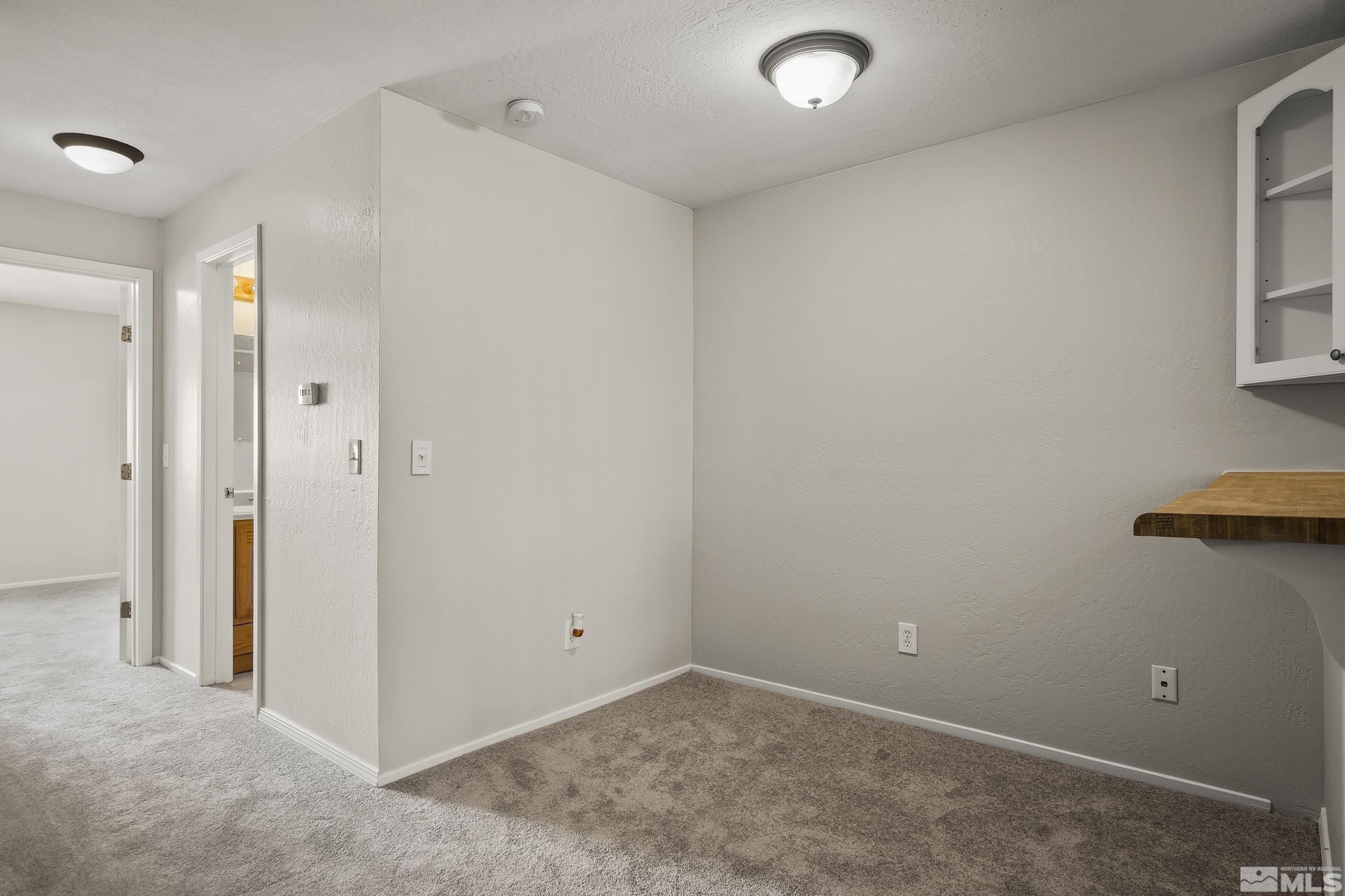 4694 Rio Poco Road Reno, NV 89502 - Photo 7 of 19 a view of an empty room