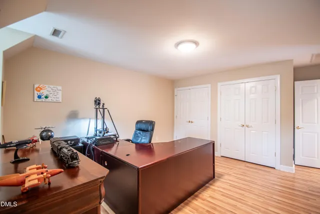 a view of a workspace with furniture