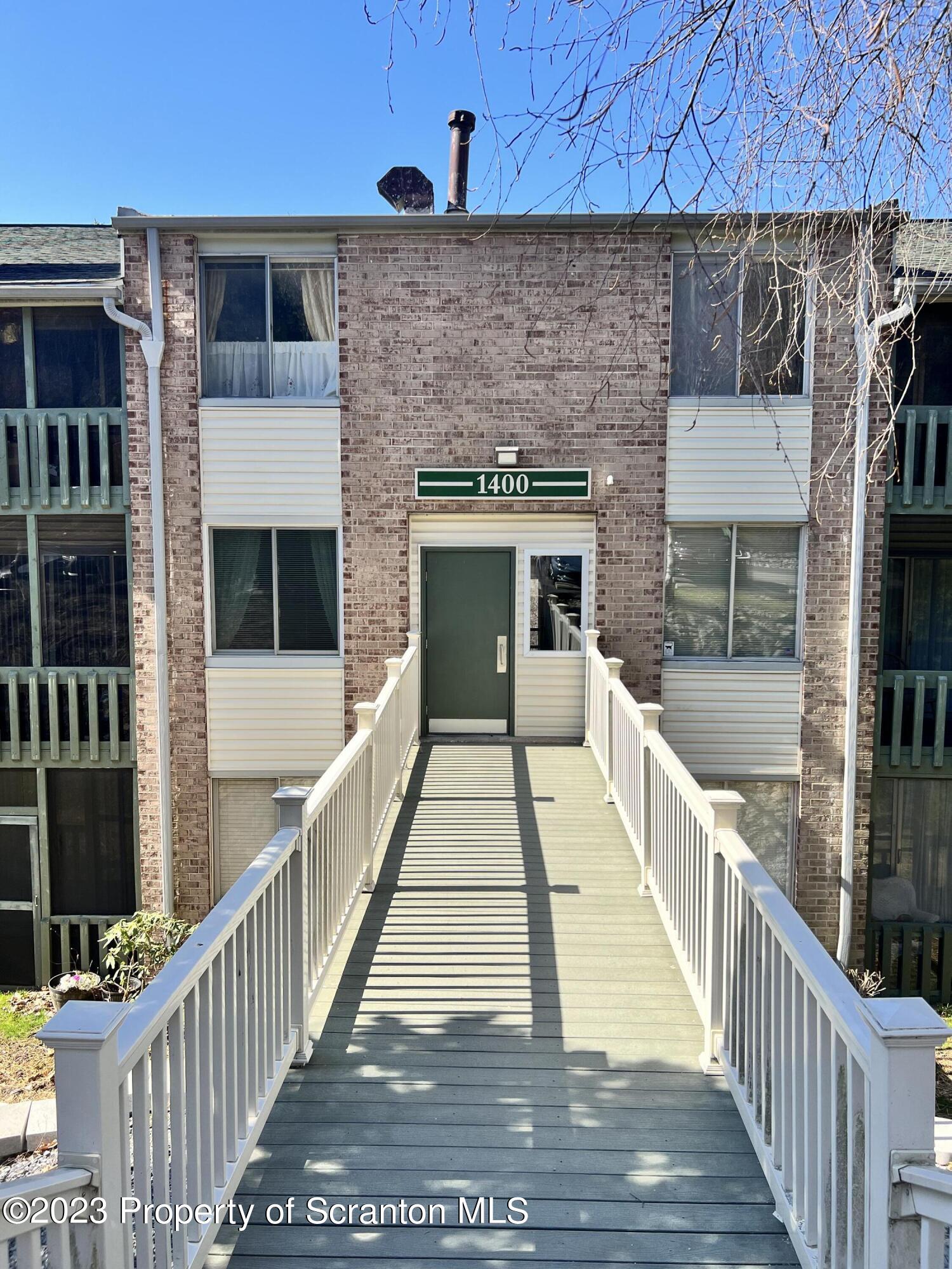 1410 Summit Point Route Scranton, PA 18508 - Photo 1 of 19 a view of a balcony and car parked