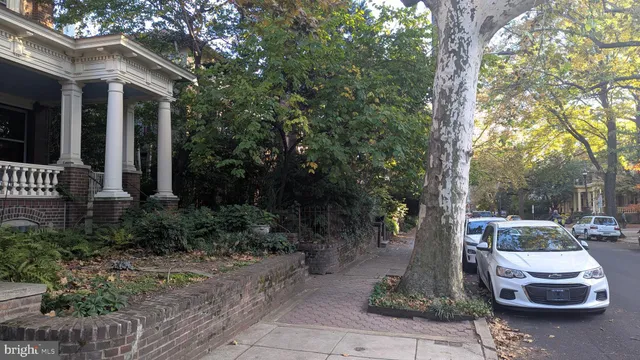 a view of a car parked in front of house