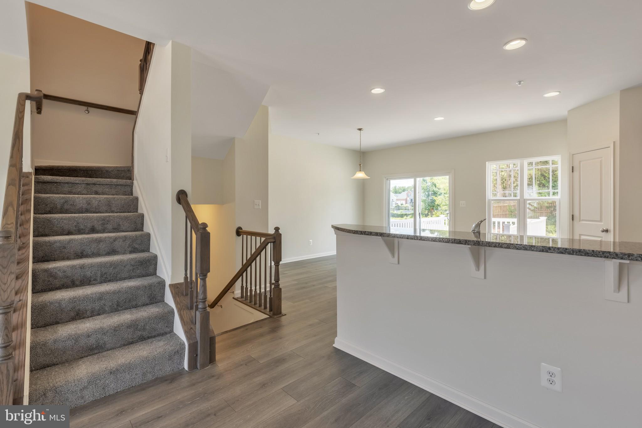 821 Magnolia Ridge Court Joppa, MD 21085 - Photo 11 of 33 a view of entryway with wooden floor and stairs