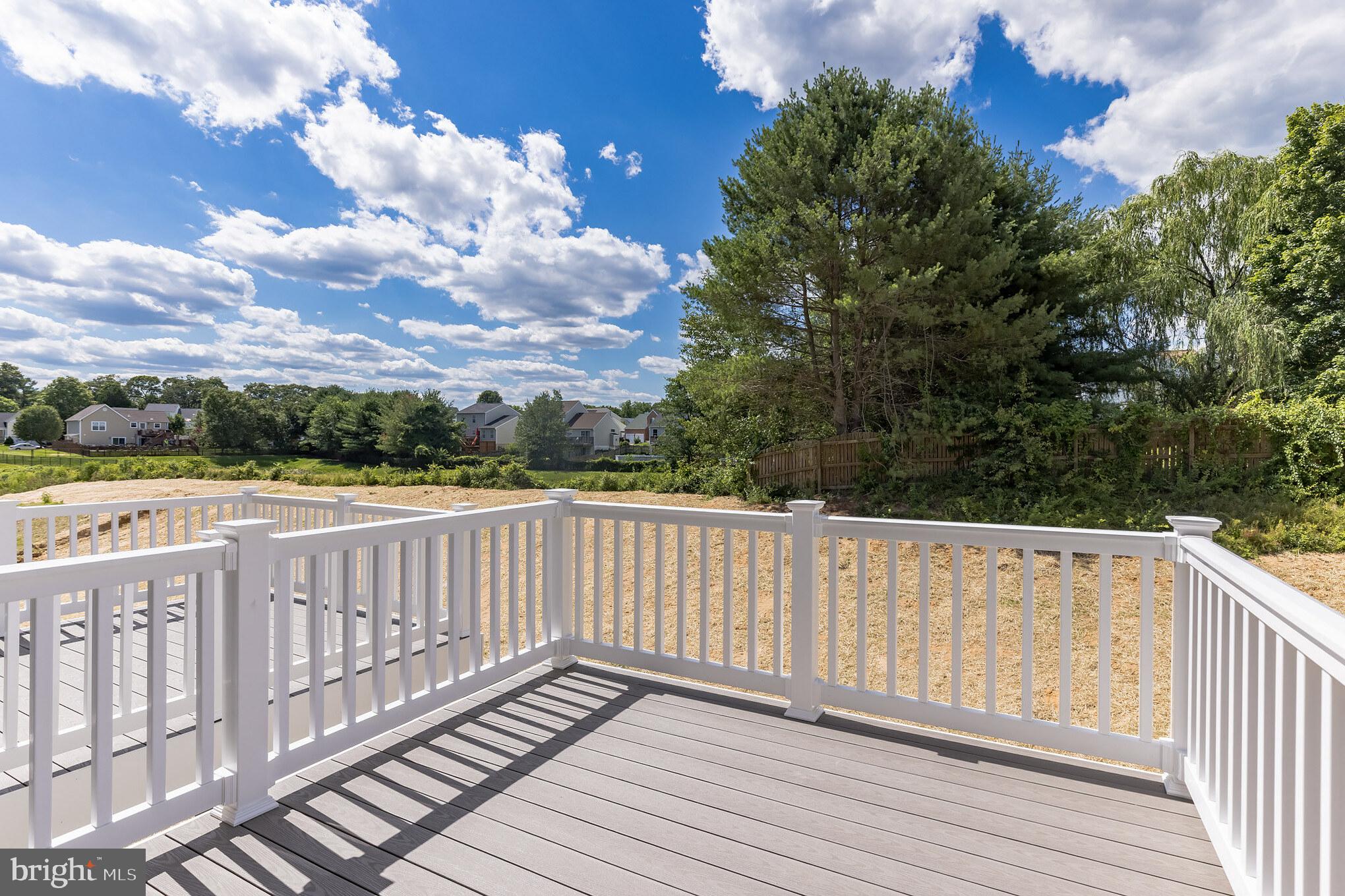 821 Magnolia Ridge Court Joppa, MD 21085 - Photo 18 of 33 a view of a balcony with wooden fence