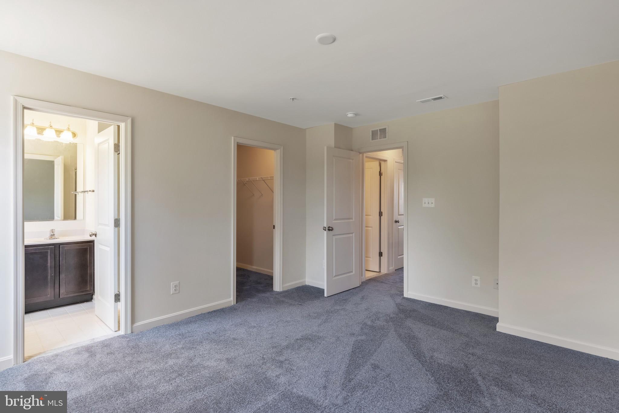 821 Magnolia Ridge Court Joppa, MD 21085 - Photo 20 of 33 an empty room with closet and a bathroom