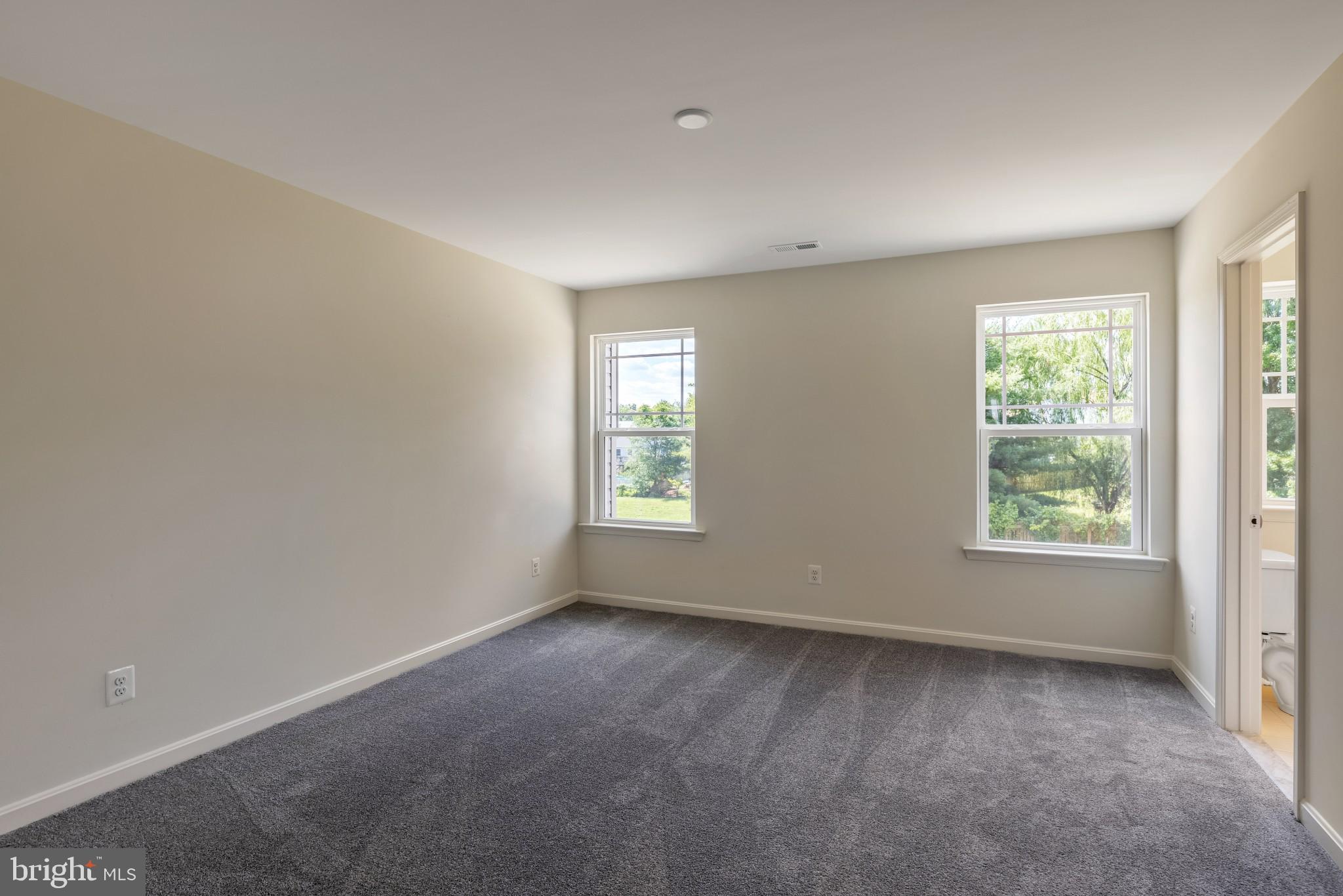 821 Magnolia Ridge Court Joppa, MD 21085 - Photo 21 of 33 an empty room with windows
