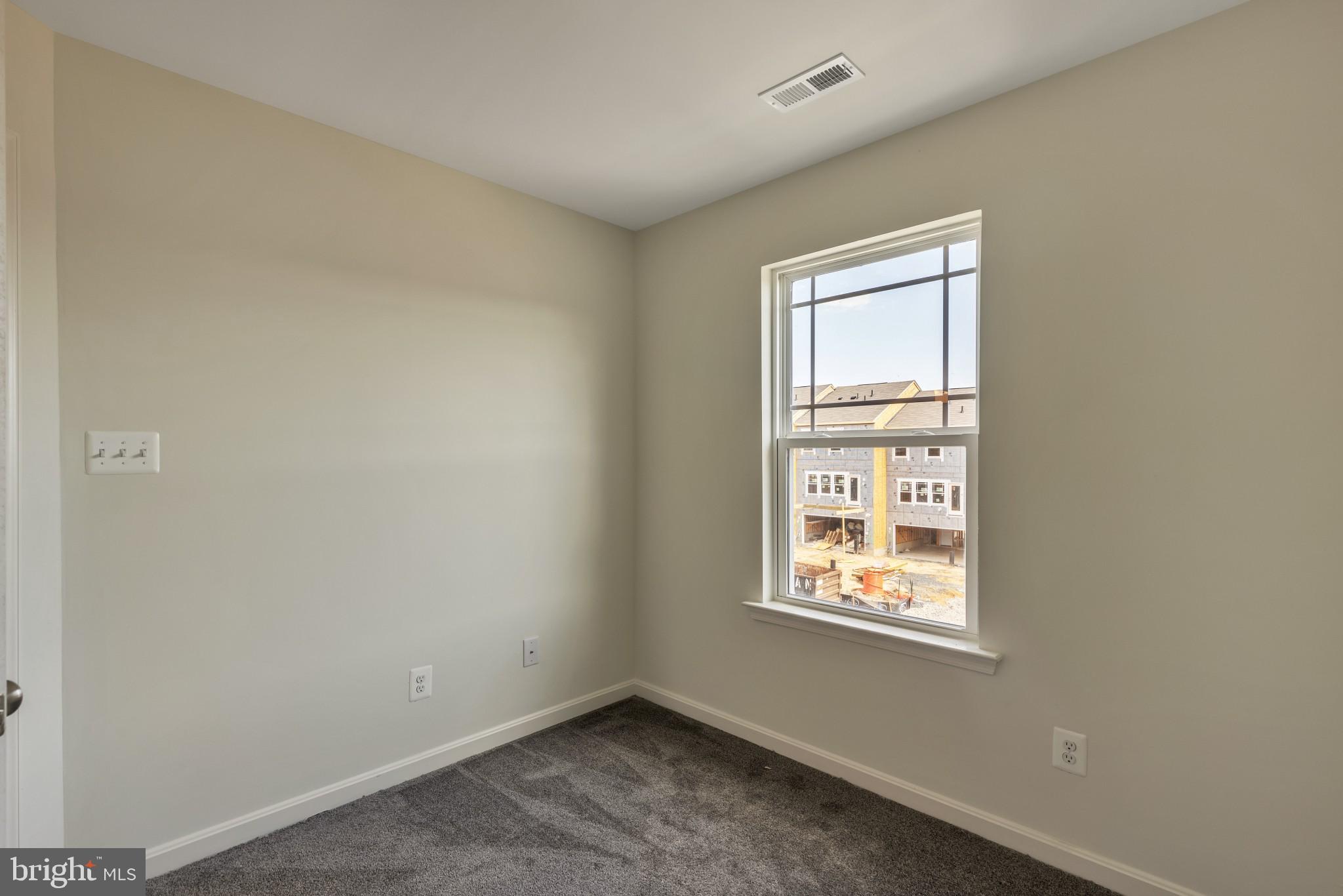 821 Magnolia Ridge Court Joppa, MD 21085 - Photo 29 of 33 an empty room with windows