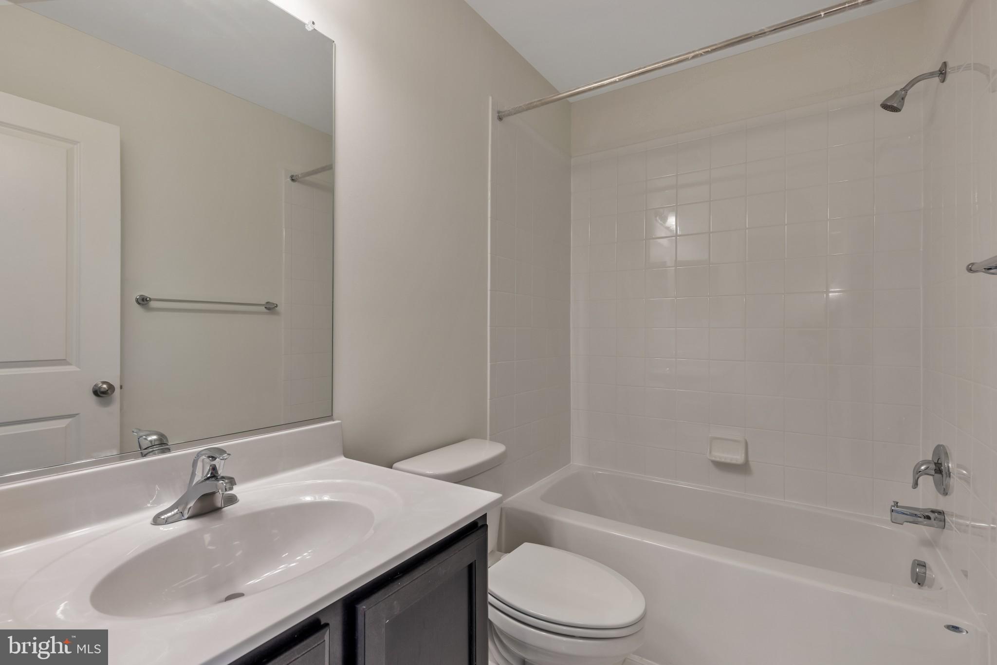 821 Magnolia Ridge Court Joppa, MD 21085 - Photo 31 of 33 a bathroom with a sink toilet and bathtub