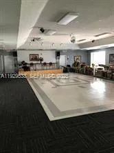 a view of a house with a backyard and porch