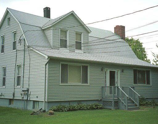 934 Daniels Farm Road Trumbull, CT 06611 - Photo 1 of 1 a front view of a house with a yard