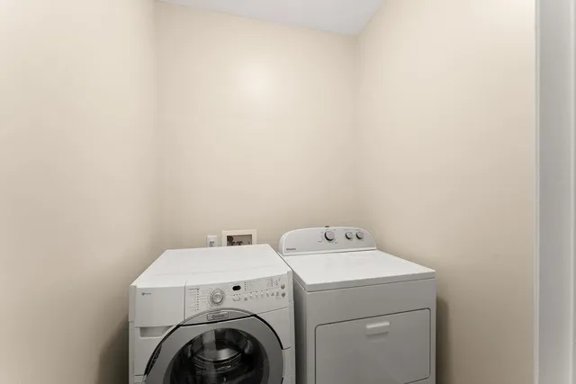 a view of a hallway with windows