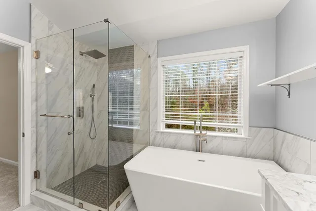 a bathroom with a sink and a bathtub