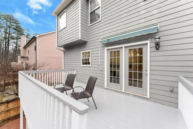 a view of balcony with wooden floor and outdoor space