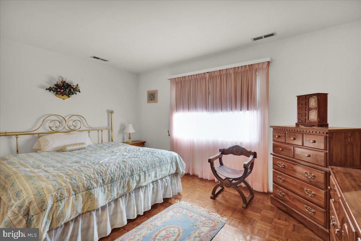 12 Muirfield Drive Reading, PA 19607 - Photo 11 of 18 a bedroom with a bed and dresser