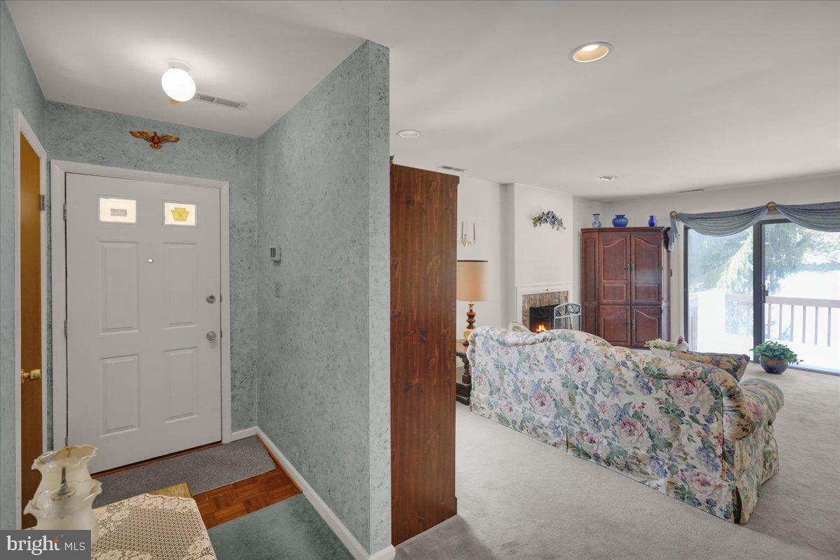12 Muirfield Drive Reading, PA 19607 - Photo 3 of 18 a living room with a bed furniture and a window