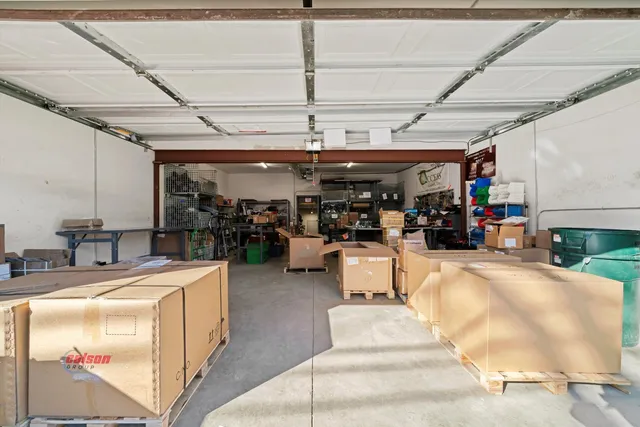 a room with lots of furniture and clutter