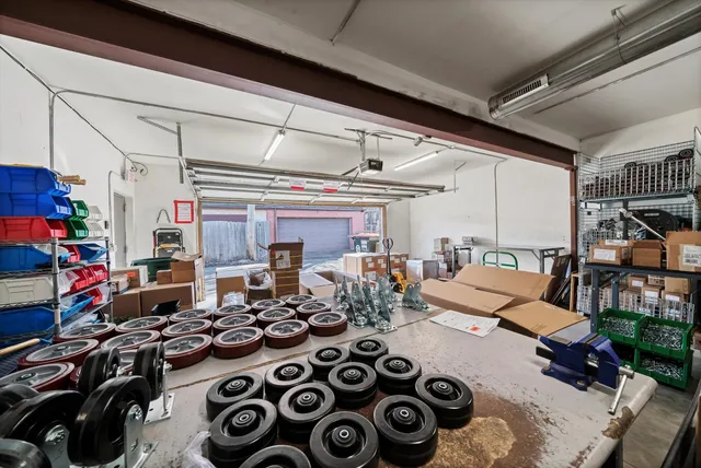 a bathroom with a toilet a sink and a mirror