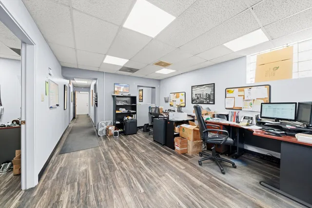 a view of a workspace with furniture and a livingroom