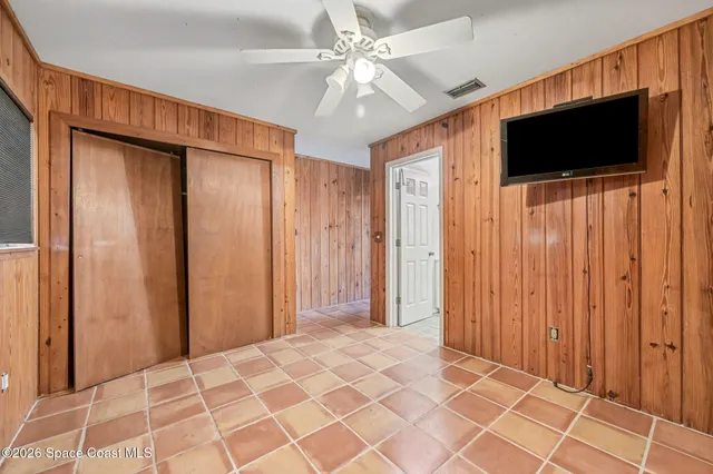 a view of a livingroom with a flat screen tv