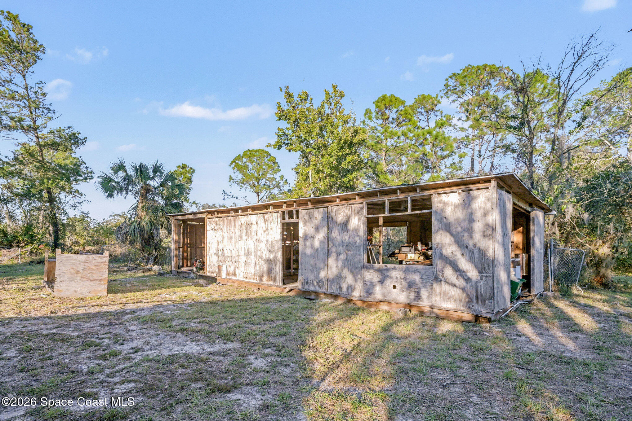 5195 Blounts Ridge Road Mims, FL 32754 - Photo 22 of 28 front view of a house with a yard