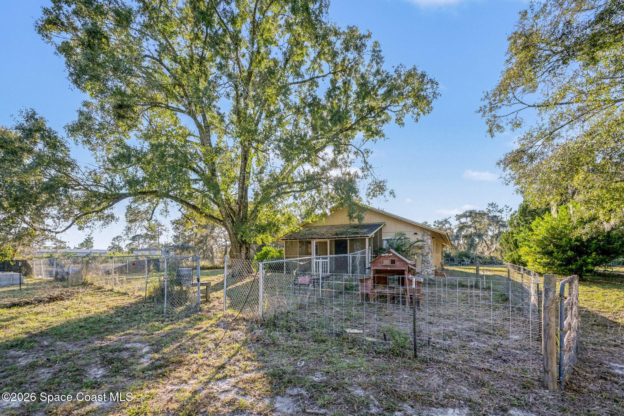 5195 Blounts Ridge Road Mims, FL 32754 - Photo 24 of 28 a view of a outdoor space with a patio