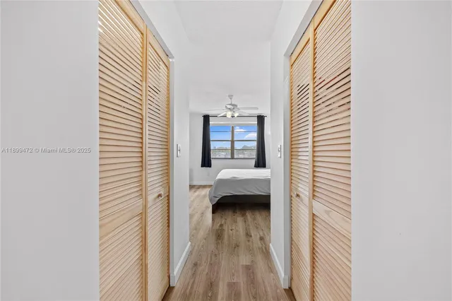 a view of a bedroom from a hallway