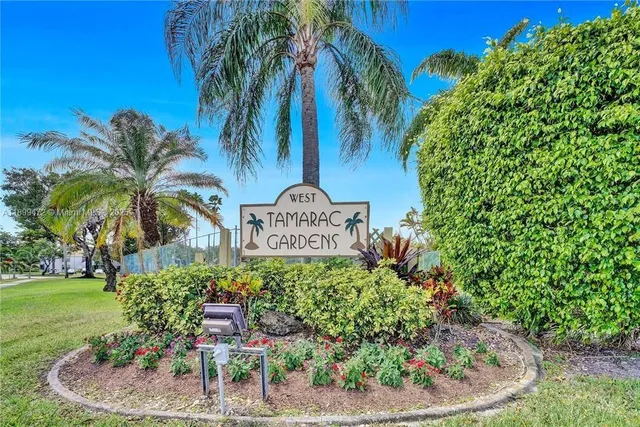 a view of a garden with a fountain