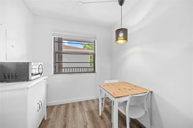 a view of a storage & utility room with a window