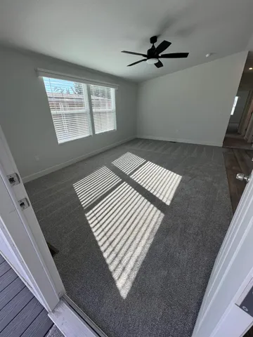 a view of empty room with windows