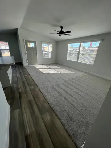 a view of a kitchen with a sink