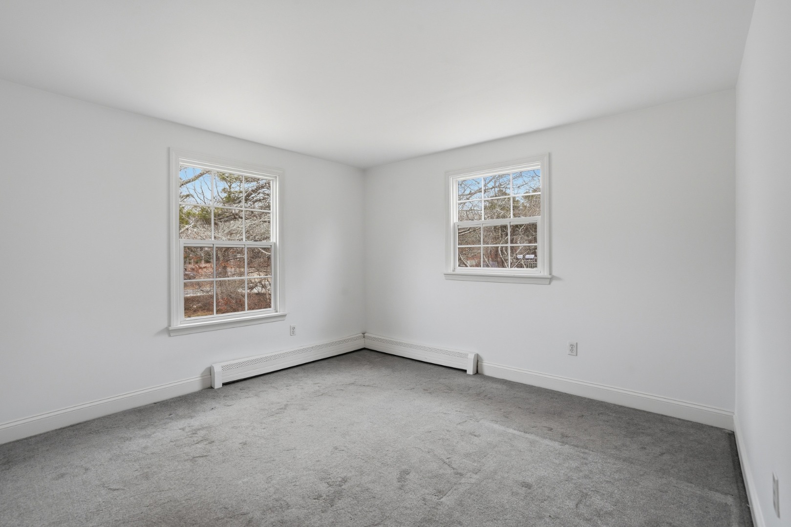 67 12th Street Edgartown, MA 02539 - Photo 14 of 26 an empty room with a window