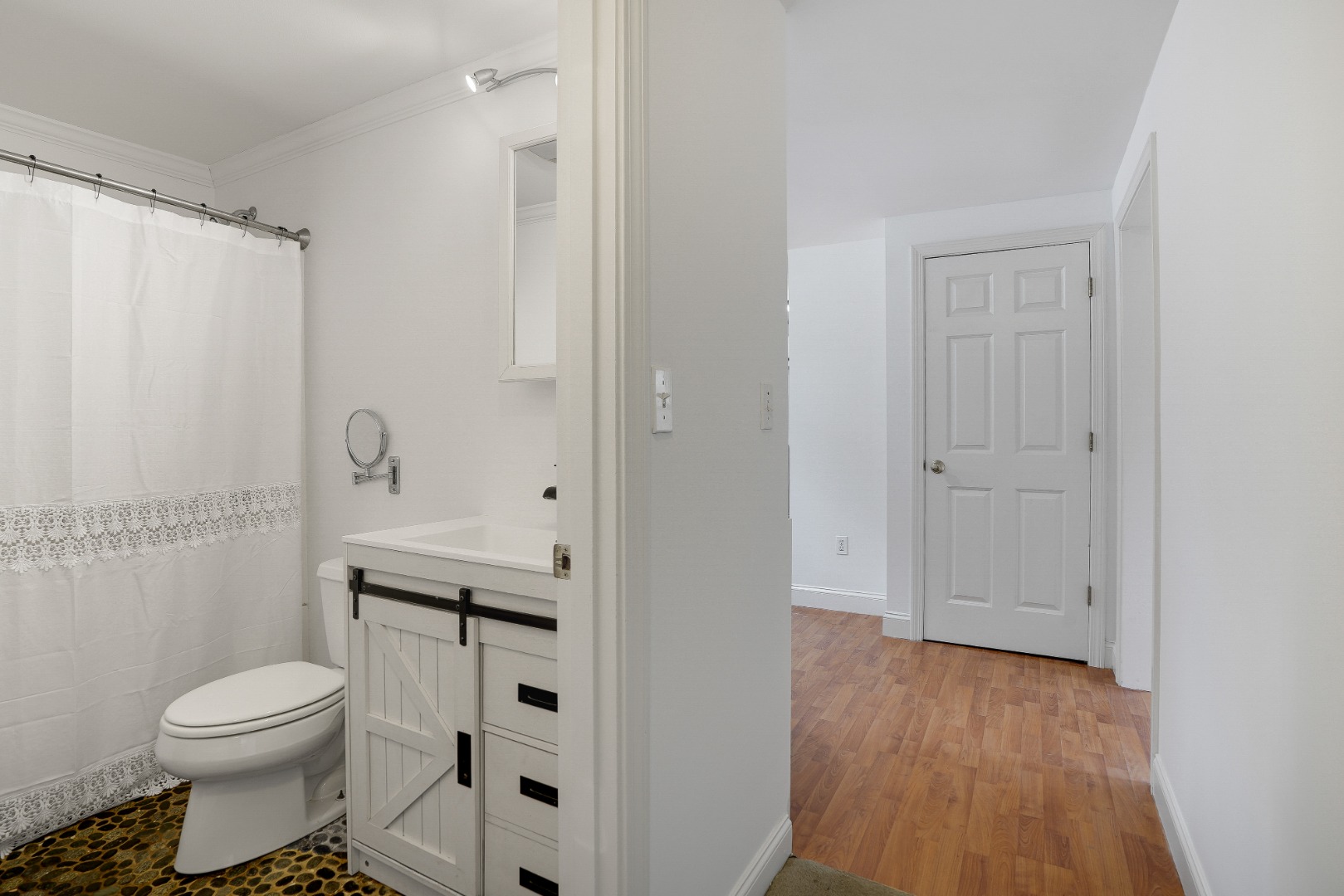 67 12th Street Edgartown, MA 02539 - Photo 16 of 26 a bathroom with a toilet a sink and shower