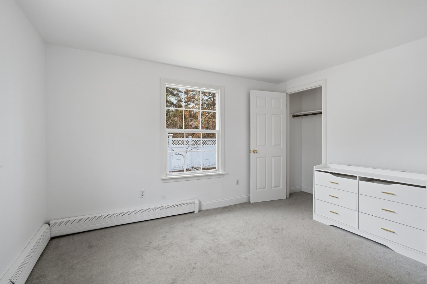 67 12th Street Edgartown, MA 02539 - Photo 20 of 26 an empty room with cabinet