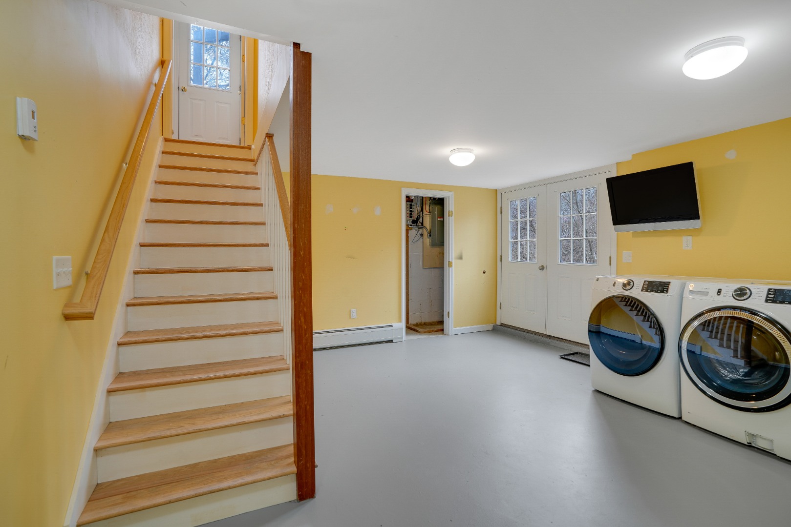 67 12th Street Edgartown, MA 02539 - Photo 21 of 26 a view of a livingroom with wooden floor and entryway
