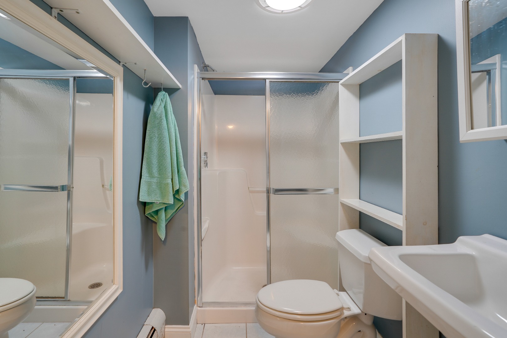 67 12th Street Edgartown, MA 02539 - Photo 25 of 26 a bathroom with a toilet and a shower