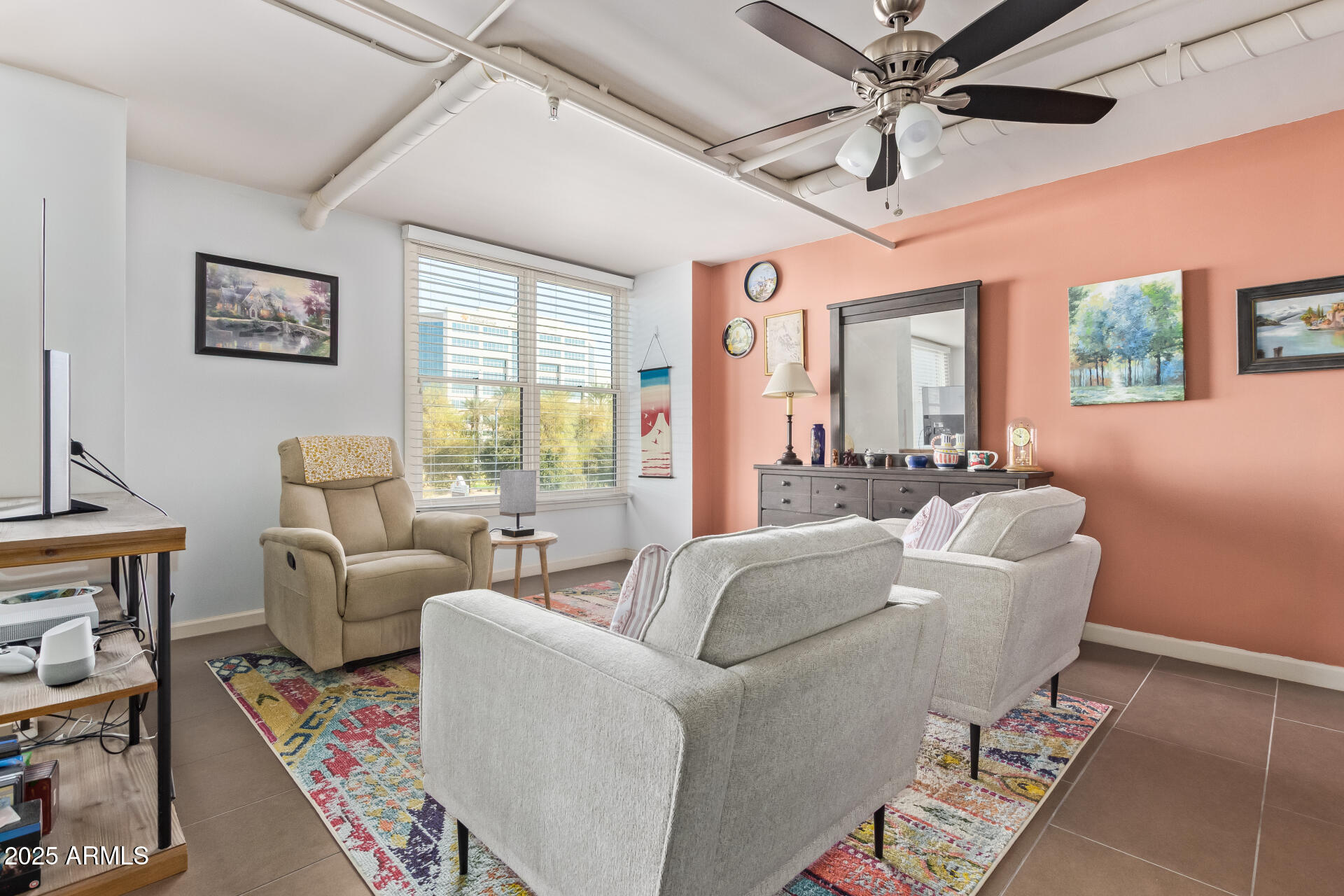 535 West Thomas Road, Unit 313 Phoenix, AZ 85013 - Photo 13 of 31 a living room with furniture and a large window