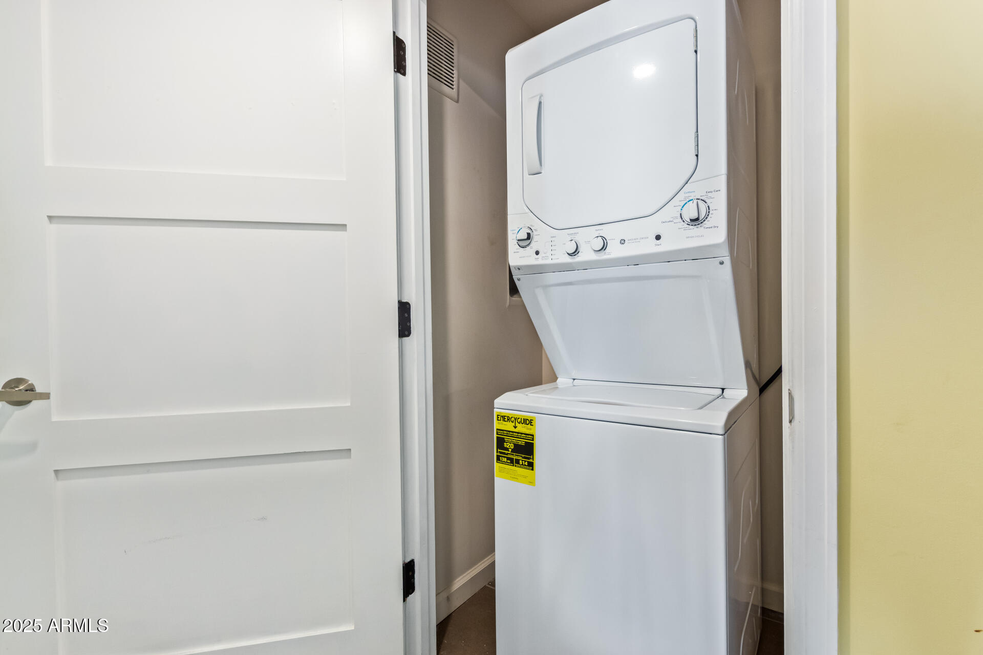 535 West Thomas Road, Unit 313 Phoenix, AZ 85013 - Photo 31 of 31 a close up view of a washer and dryer with a mirror