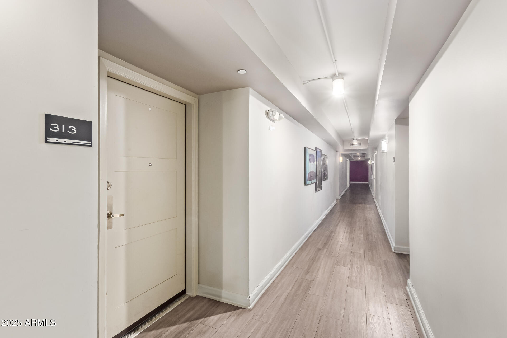 535 West Thomas Road, Unit 313 Phoenix, AZ 85013 - Photo 7 of 31 a view of hallway with stairs
