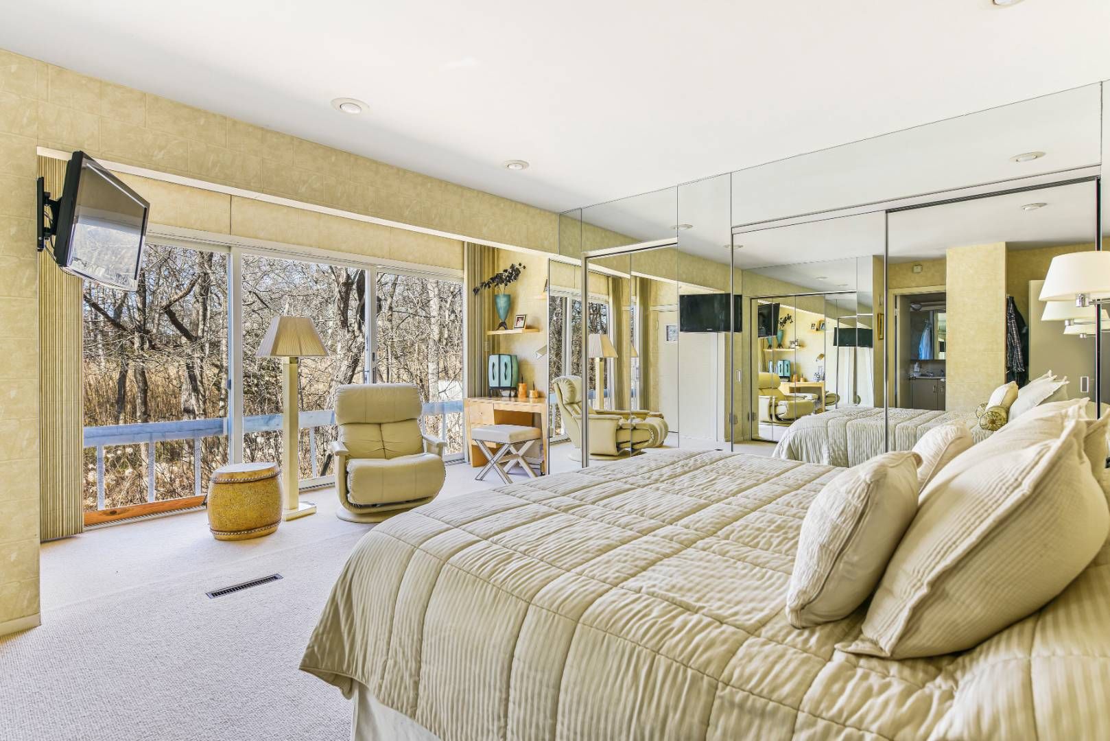 45 South Country Road Westhampton, NY 11977 - Photo 12 of 22 a bedroom with a bed couch and a window