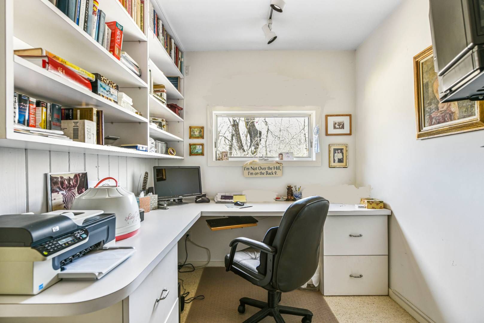 45 South Country Road Westhampton, NY 11977 - Photo 13 of 22 a view of a workspace with furniture and a window