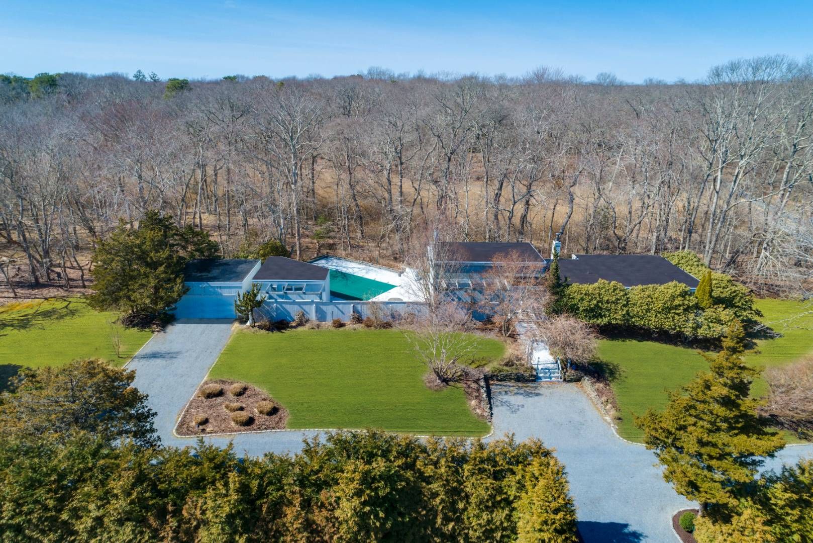 45 South Country Road Westhampton, NY 11977 - Photo 2 of 22 aerial view of a house with a garden and a yard